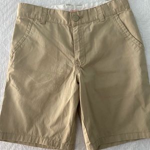 Three pairs of kids’ khaki shorts